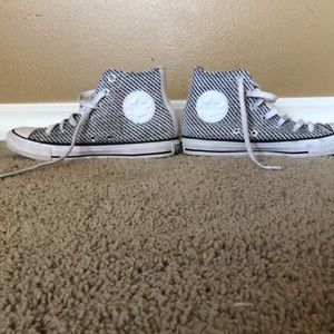 Black and white striped high top converse